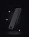 Matte Black Weekly Pill Organizer by Ikigai Cases. The metal pill box is shown floating in the air for dramatic effect.