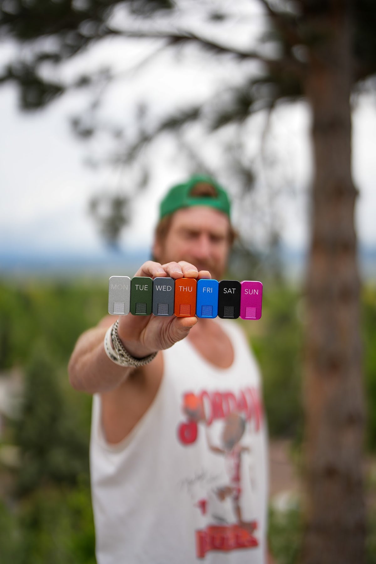 Eric Hinman holding a week of MagNano cases out toward the camera