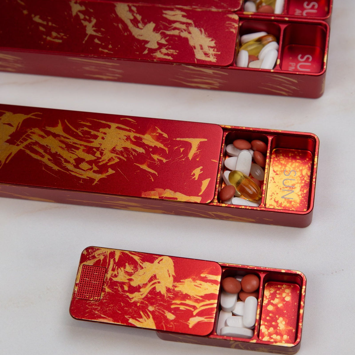 Open Dancing Dragon cases with pills on marble