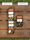 One Weekly Pill Case and One Mission Pill Case by Ikigai Cases. The diagram is using various pills and vitamins to illustrate the storage capacity in each of the pockets. The metal pill boxes are meant to be used as travel pill boxes and weekly pill organizers.